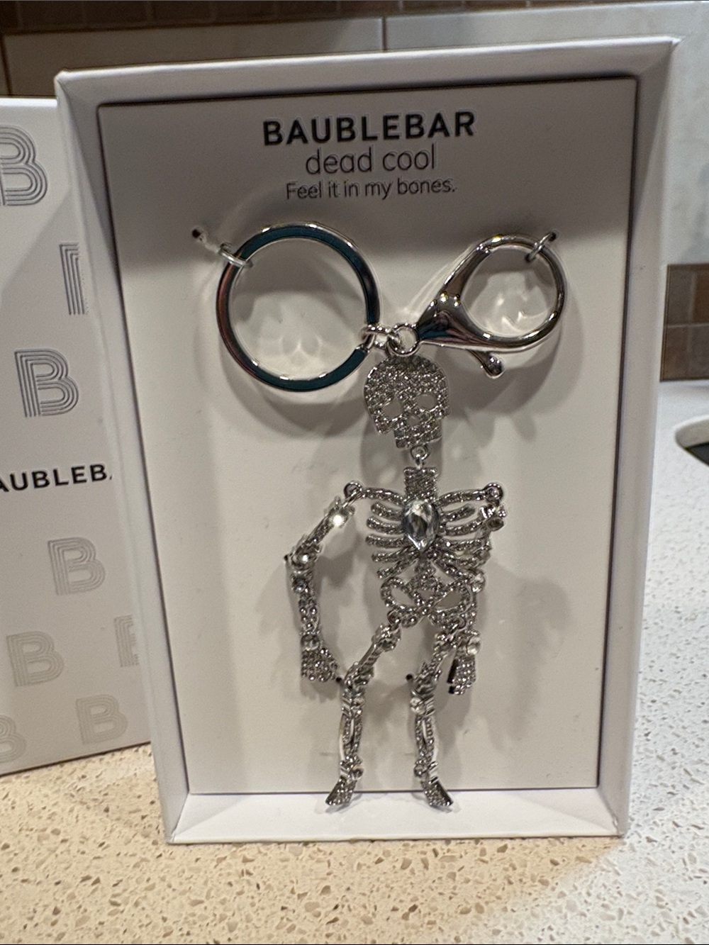 BaubleBar NIB Silver Crystal Skeleton Keychain/Bag Charm